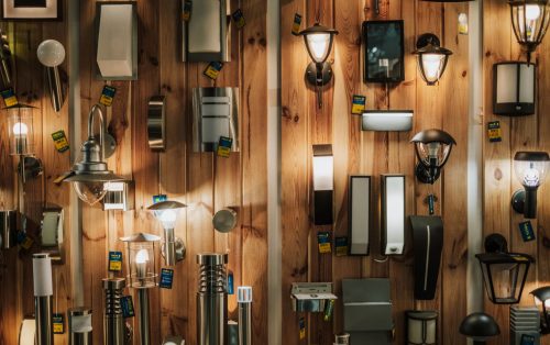 pexels photo 9087711 9087711 A vibrant display of various wall lamps in a lighting store in Gostyń, Poland.